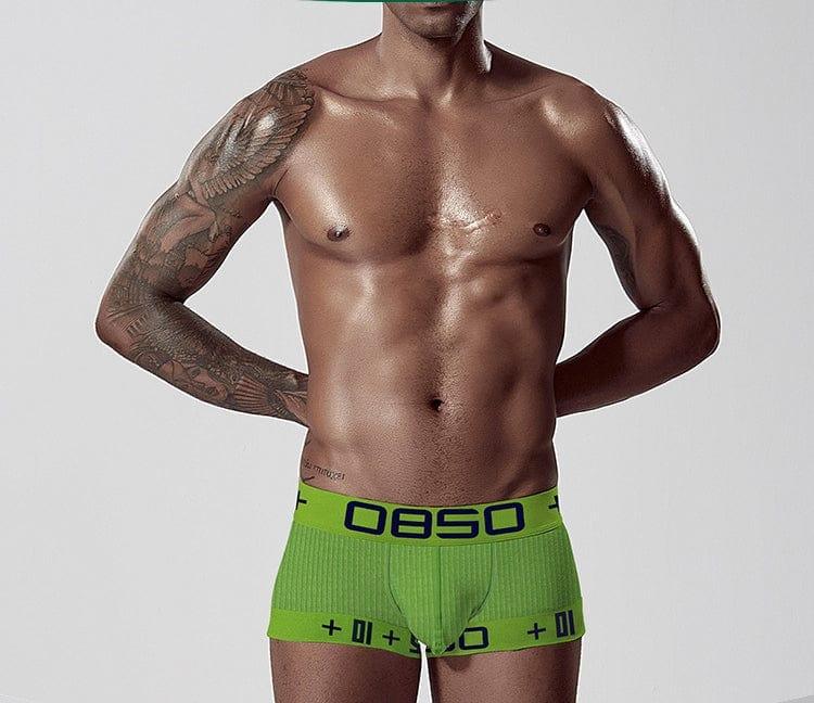 Daily wear|Gym sessions|Holiday parties|Pride events|Night gatherings|Breathable|Butt-lift design|Comfort|Proper support|Stylish appearance|Festive mood|Men's trunks|Low-rise underwear|Solid color trunks|Sexy trunks|Green|Front view