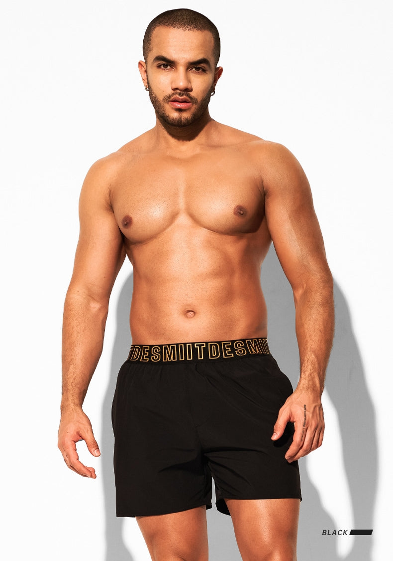 Front view of DESMIIT Low Rise Quick-Dry Swim Beach Shorts with Quick Dry feature in Black.