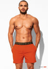 Front view of DESMIIT Low Rise Quick-Dry Swim Beach Shorts with Quick Dry feature in Orange.