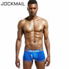 JOCKMAIL Bulge Pouch Mesh Boxers men's breathable mesh underwear in colorful blue, front view