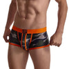 Daily wear|Gym sessions|Holiday parties|Pride events|Night gatherings|Breathable|Butt-lift design|Snug fit|Lightweight|Shaping|Waistline control|Slimming|Abdomen control|Comfort|Proper support|Stylish appearance|Festive mood|Body sculpting|Men's trunks|Low-rise underwear|Polyester pouch trunks|Camo mesh trunks|Sports trunks|Orange|Front view
