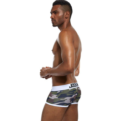 Daily wear|Gym sessions|Holiday parties|Pride events|Night gatherings|Breathable|Butt-lift design|Snug fit|Lightweight|Shaping|Waistline control|Slimming|Abdomen control|Comfort|Proper support|Stylish appearance|Festive mood|Body sculpting|Men's trunks|Low-rise underwear|Camo trunks|Sexy trunks|Green|Left Side view