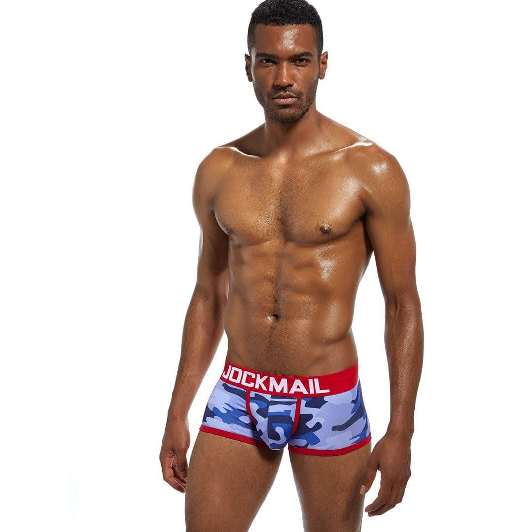 Daily wear|Gym sessions|Holiday parties|Pride events|Night gatherings|Breathable|Butt-lift design|Snug fit|Lightweight|Shaping|Waistline control|Slimming|Abdomen control|Comfort|Proper support|Stylish appearance|Festive mood|Body sculpting|Men's trunks|Low-rise underwear|Camo trunks|Sexy trunks|Red|Front view