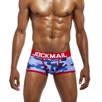 Daily wear|Gym sessions|Holiday parties|Pride events|Night gatherings|Breathable|Butt-lift design|Snug fit|Lightweight|Shaping|Waistline control|Slimming|Abdomen control|Comfort|Proper support|Stylish appearance|Festive mood|Body sculpting|Men's trunks|Low-rise underwear|Camo trunks|Sexy trunks|Red|Front view2