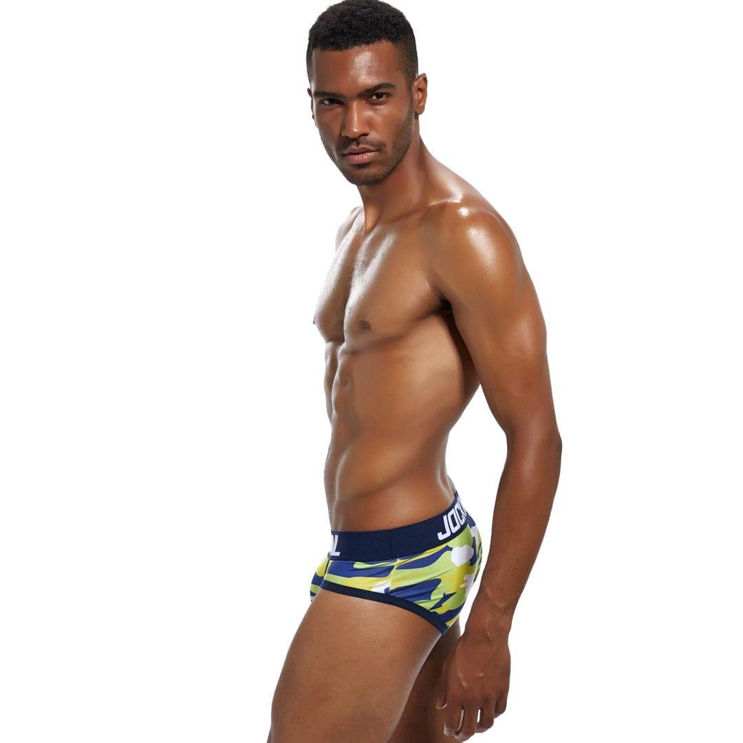 Daily wear|Gym sessions|Holiday parties|Pride events|Night gatherings|Breathable|Butt-lift design|Snug fit|Lightweight|Shaping|Waistline control|Slimming|Abdomen control|Antibacterial|Comfort|Proper support|Stylish appearance|Festive mood|Body sculpting|Men's trunks|Low-rise underwear|Camo trunks|Vigor series trunks|Sexy trunks|Yellow|Left Side view