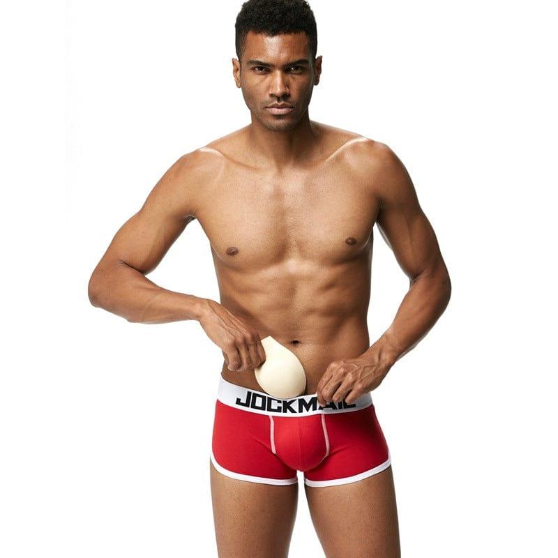 Daily wear|Gym sessions|Holiday parties|Pride events|Night gatherings|Breathable|Butt-lift design|Snug fit|Lightweight|Shaping|Waistline control|Slimming|Abdomen control|Comfort|Proper support|Stylish appearance|Festive mood|Body sculpting|Men's trunks|Low-rise underwear|Cotton trunks|Sponge pad trunks|Sexy trunks|Red|Front view