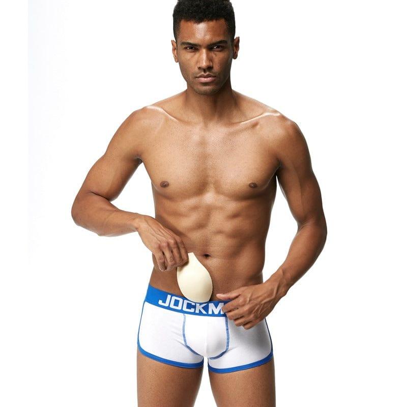Daily wear|Gym sessions|Holiday parties|Pride events|Night gatherings|Breathable|Butt-lift design|Snug fit|Lightweight|Shaping|Waistline control|Slimming|Abdomen control|Comfort|Proper support|Stylish appearance|Festive mood|Body sculpting|Men's trunks|Low-rise underwear|Cotton trunks|Sponge pad trunks|Sexy trunks|White|Front view