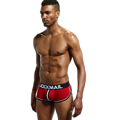 Daily wear|Gym sessions|Holiday parties|Pride events|Night gatherings|Breathable|Butt-lift design|Snug fit|Lightweight|Shaping|Waistline control|Slimming|Abdomen control|Comfort|Proper support|Stylish appearance|Festive mood|Body sculpting|Men's trunks|Low-rise underwear|Polyester pouch trunks|Sexy trunks|Open-back trunks|Red|Left Side view