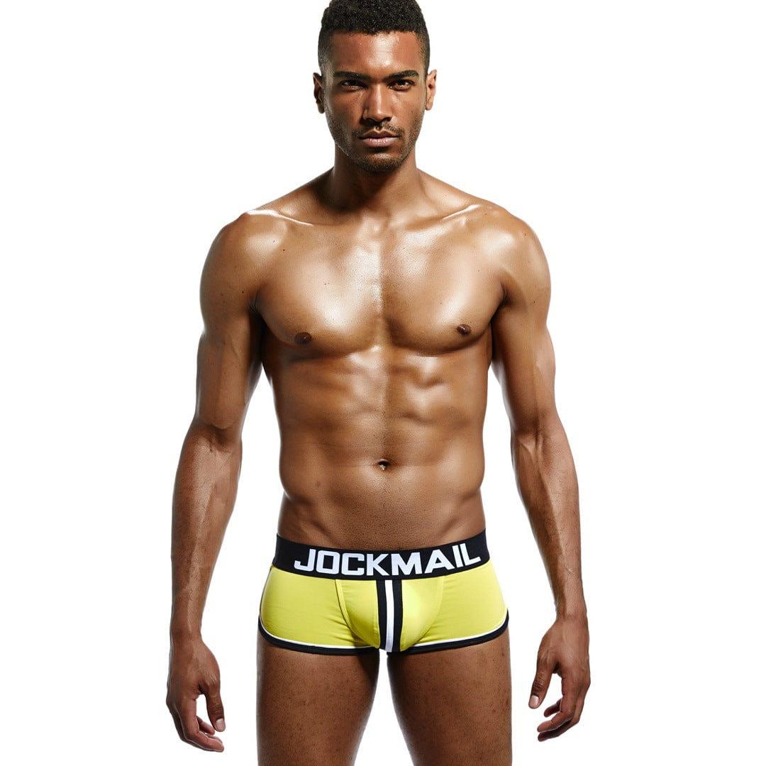 Daily wear|Gym sessions|Holiday parties|Pride events|Night gatherings|Breathable|Butt-lift design|Snug fit|Lightweight|Shaping|Waistline control|Slimming|Abdomen control|Comfort|Proper support|Stylish appearance|Festive mood|Body sculpting|Men's trunks|Low-rise underwear|Polyester pouch trunks|Sexy trunks|Open-back trunks|Yellow|Front view