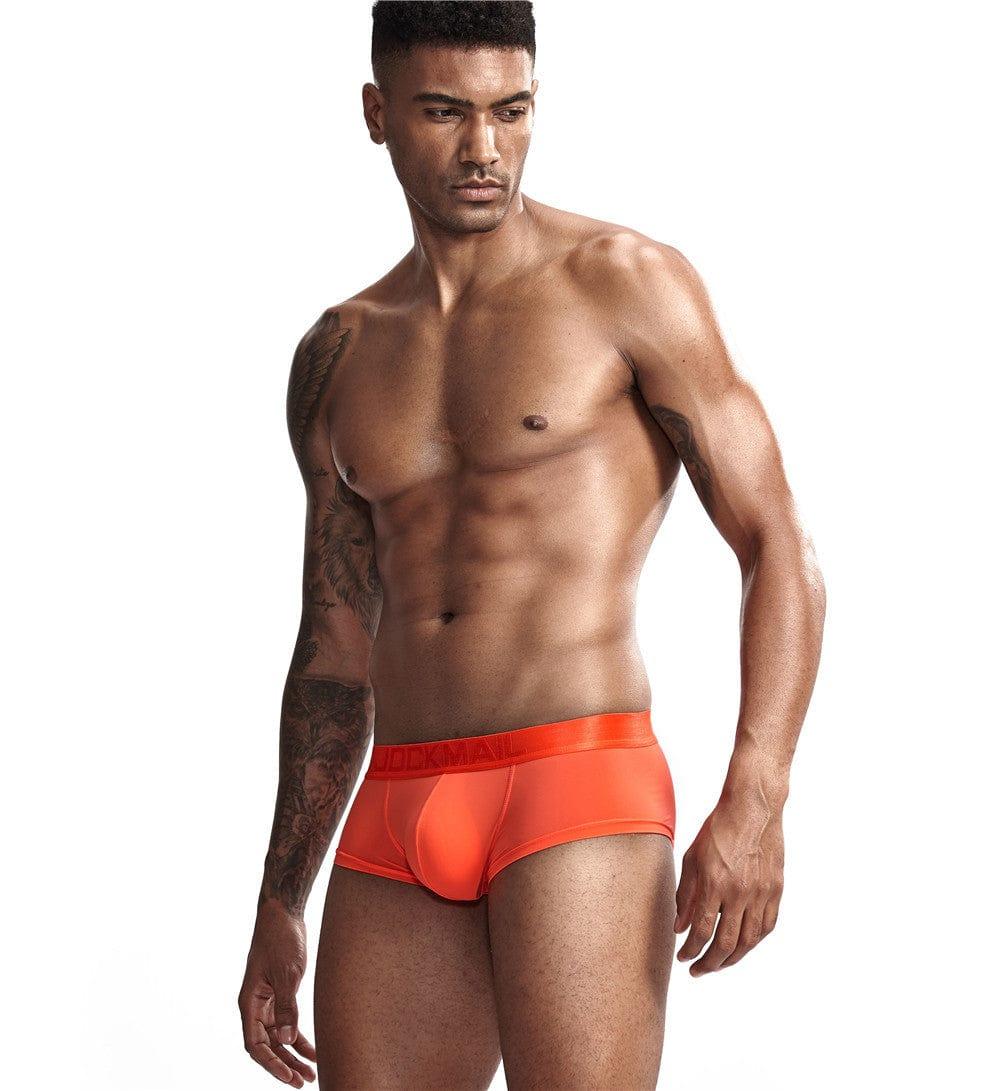 Daily wear|Gym sessions|Holiday parties|Pride events|Night gatherings|Breathable|Butt-lift design|Snug fit|Lightweight|Shaping|Waistline control|Slimming|Abdomen control|Comfort|Proper support|Stylish appearance|Festive mood|Body sculpting|Men's trunks|Low-rise underwear|Polyester pouch trunks|Vibrant sheer trunks|Sexy trunks|Orange|Left Side view