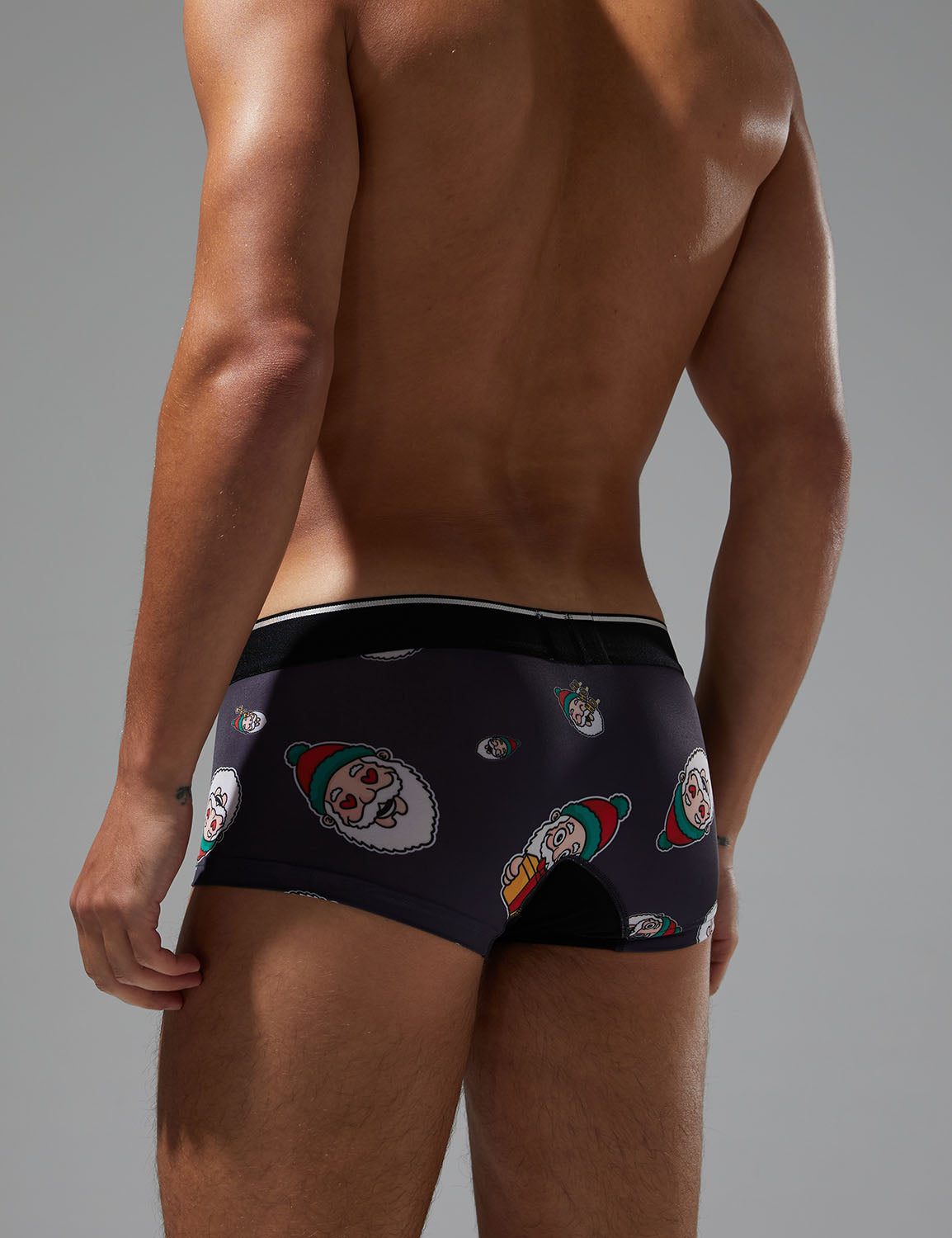 Holiday celebration|Christmas party|Winter lounging|Romantic gift|Breathable|Butt-lifting|Festive style|Body accentuation|Holiday mood|Lightweight comfort|Men's trunks|Low-rise underwear|Christmas underwear|SEOBEAN briefs|Black|Back view