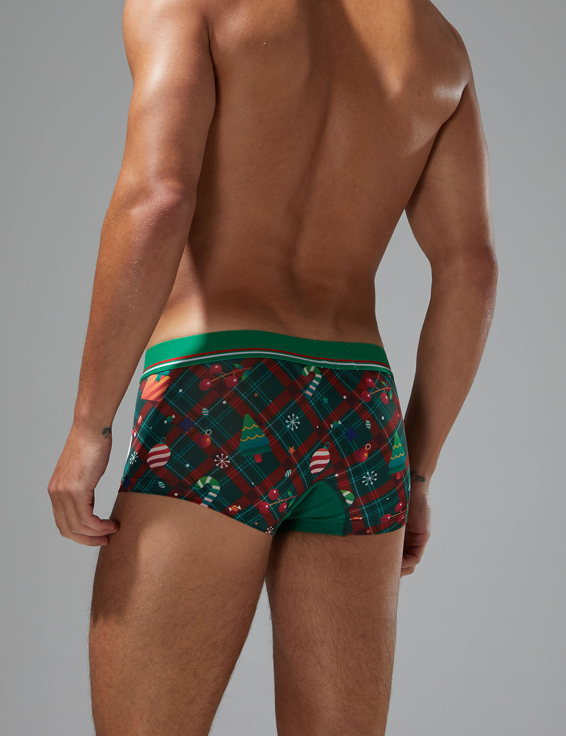 Holiday celebration|Christmas party|Winter lounging|Romantic gift|Breathable|Butt-lifting|Festive style|Body accentuation|Holiday mood|Lightweight comfort|Men's trunks|Low-rise underwear|Christmas underwear|SEOBEAN briefs|Green|Back view