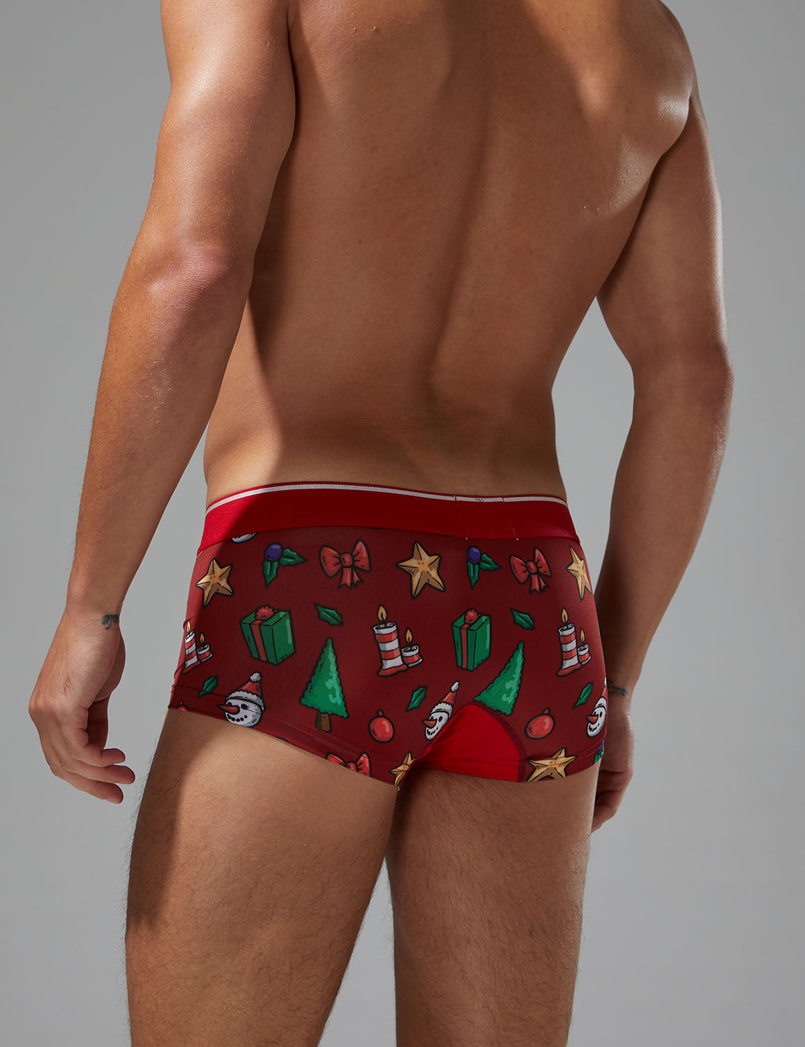 Holiday celebration|Christmas party|Winter lounging|Romantic gift|Breathable|Butt-lifting|Festive style|Body accentuation|Holiday mood|Lightweight comfort|Men's trunks|Low-rise underwear|Christmas underwear|SEOBEAN briefs|Red|Back view