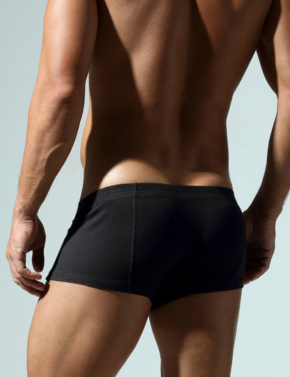 Daily wear|Home lounging|Casual outings|Romantic nights|Comfortable|Soft waistband|Non-restrictive|Relaxed fit|Gentle feel|Basic coverage|Soft support|Men's trunks|Low-rise underwear|Buttoned trunks|Casual underwear|Black|Back view