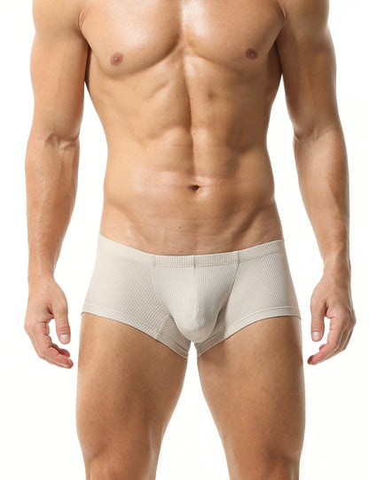 Gym workout|Sports training|Running sessions|Fitness routines|Athletic fit|Breathable|Supportive waistband|Moisture control|Muscle support|Freedom of movement|Daily activity|Men's trunks|Sport underwear|Low-rise trunks|TAUWELL trunks|White|Front view